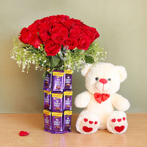 Darling Delight: A Gift Combo of 20 Red Roses and 18 Dairy Milk Arrangement, and 12 Inch Teddy