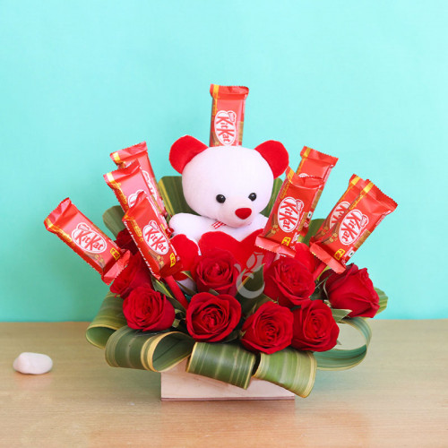 Cuteness Defined: A Gift Combo of Box Arrangement, 10 KitKat, 10 Red Roses, and 6 Inch Teddy
