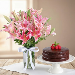 Perfect Day With Lilies: A Gift Combo of 6 Pink Lily in a Glass Vase and 0.5 Kg Chocolate Cake
