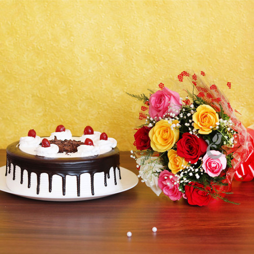 Adorably Warm: A Gift Combo of 8 mixed roses and 0.5 Kg Black Forest cake