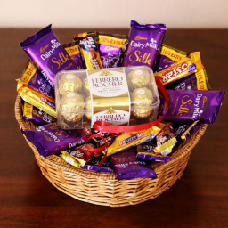 Indulgent Delight: A Gift Combo of 10 Five Star, 5 Cadbury Dairy Milk Silk, 10 Dairy Milk, 16 pcs Ferrero Rocher and basket