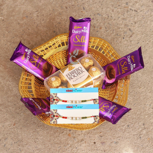 5 Dairy Milk Silk, 16 Pic Ferrero Rocher, 2 Rakhi