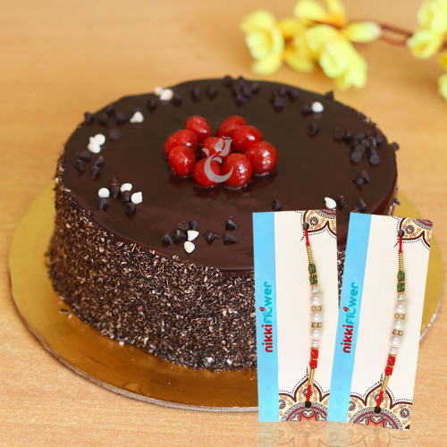 Slumpy Chocolaty Rakhi Present: A Gift Combo of 0.5 Kg Chocolate Truffle Cake, 2 Rakhi, and Roli Chawal