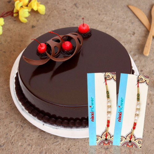 Cakelicious Rakhi Pack: A Gift Combo of 0.5 Kg Chocolate Cake, 2 Rakhi, and Roli Chawal