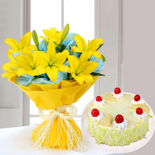 Vibrant Lilies with cake: A Gift Combo of 5 Lilies and 0.5 Kg Pineapple Cake