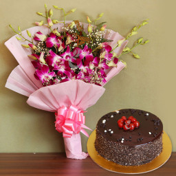 Lavish Orchids Combo: A Gift Combo of 6 Orchids and 0.5 Kg Chocolate Cake