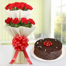 Carnation Delight: A Gift Combo of 2 Tier Bouquet of 18 Red Carnation and 0.5 Kg Chocolate Cake