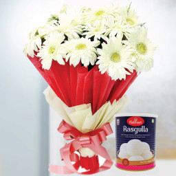 Epitome Of Soothness: A Gift Combo of 12 White Gerbera and 1 Kg Rasgulla