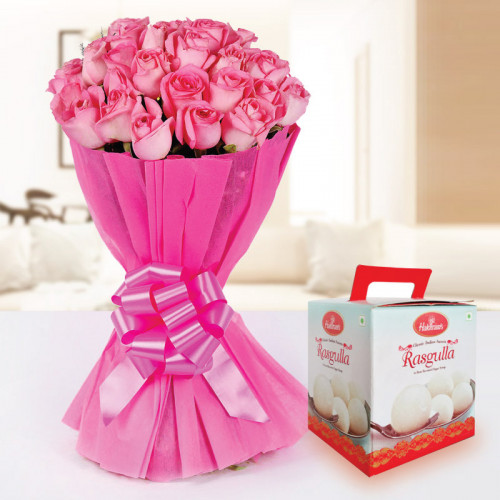 Aroma Of Love: A Gift Combo of 20 Pink Roses and 1 Kg Rasgulla.
