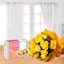 Coupled In Yellow: A Gift Combo of 12 Yellow Roses and 500 gm Besan Ladoo.