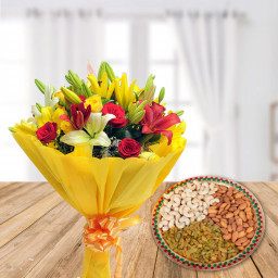 Fulfilling Bounty: A Gift Combo of Mixed Lilies & Roses and 250 gm Cashews, Almonds & Raisins