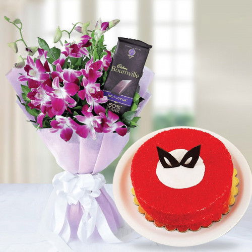 Soaked In sweetness: A Gift Combo of 0.5 kg Magical Red Velvet Cake, 6 Purple Orchids and 1 Cadbury Bournville