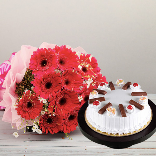 Crunchy Vanilla Ecstasy: A Gift Combo of 12 Red Gerberas and 0.5 kg KitKat Vanilla Cake