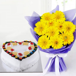 Shining With Joy: A Gift Combo of 12 Yellow Gerberas and 0.5 kg Heart-Shaped Pineapple Gems Cake