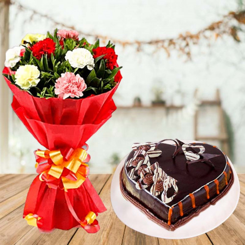 Lavishly Exuberant: A Gift Combo of 10 Mixed Carnations and 0.5 kg Chocolate Cake