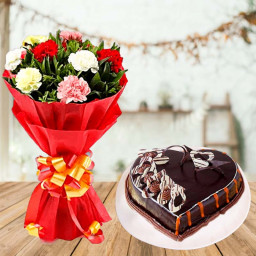 Lavishly Exuberant: A Gift Combo of 10 Mixed Carnations and 0.5 kg Chocolate Cake
