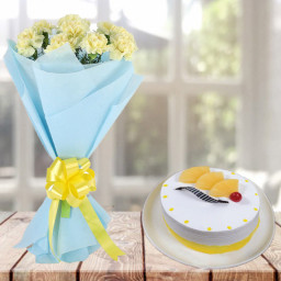 Creamy Creation: A Gift Combo of 10 Yellow Carnations and 0.5 kg Pineapple Cream Cake