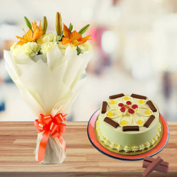 Bridge To Heart: A Gift Combo of 10 Yellow Carnations, 2 Yellow Lilies and 0.5 kg KitKat Butterscotch Cake
