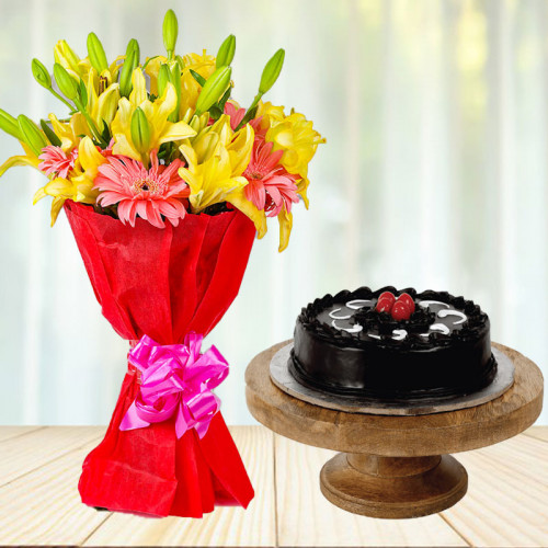 Vibes That Matches Yours: A Gift Combo of 8 Yellow Lilies, 6 Pink Gerberas and 0.5 kg Dark Truffle Cream Cake