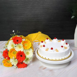 Sunny Medley: A Gift Combo of 10 Mix Gerberas and 0.5 Kg Pineapple Cake