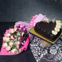 Floral Indulgence: A Gift Combo of 10 Pink Roses and 3 Purple Orchids and 0.5 Kg Heart-Shaped Chocolate Cake