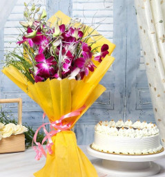 Purple Orchids and Butterscotch: A Gift Combo of 6 Purple Orchids and 0.5 Kg Butterscotch Cake