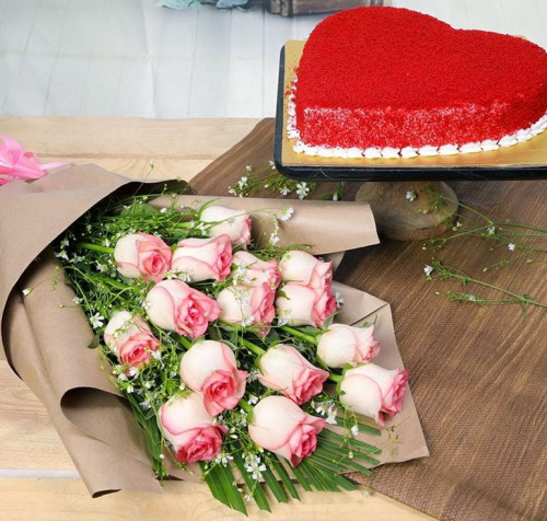 Wrapped Pink n Red Velvet Heart: A Gift Combo of 12 Pink Roses and 0.5 Kg Heart-Shaped Red Velvet Cake