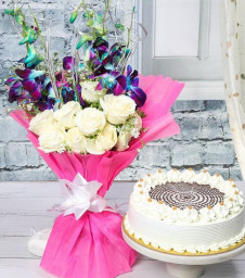 Orchids with Roses n Butterscotch: A Gift Combo of 6 White Roses and 4 Blue Orchids and 0.5 Kg Butterscotch Cake
