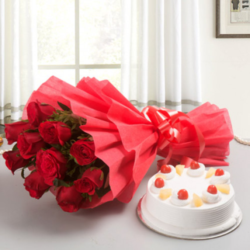 10 Red Roses n Pineaaple: A Gift Combo of 10 Red Roses and 0.5 Kg Pineapple Cake