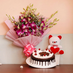 Chocolaty Pink orchid: A Gift Combo of 6 purple orchids, 0.5 kg Black Forest cake and 6 inch teddy bear
