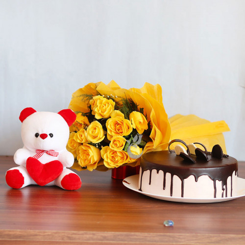 Infinite Love: A Gift Combo of 12 yellow roses, 12 inch teddy and 0.5 kg chocolate cake