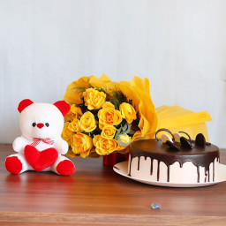 Infinite Love: A Gift Combo of 12 yellow roses, 12 inch teddy and 0.5 kg chocolate cake