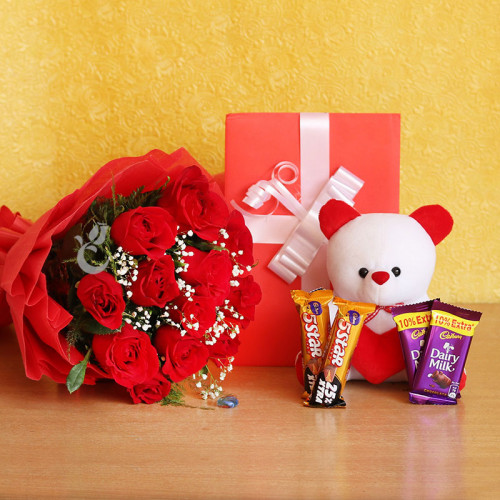 Huge Combo: A Gift Combo of 10 red roses, 2 Cadbury Dairy Milk, 2 Five Star chocolates, greeting card and white teddy