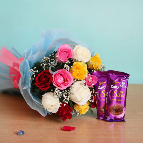 Colorful Roses And Chocolates: A Gift Combo of 12 mix roses and 2 Dairy Milk Silk chocolates