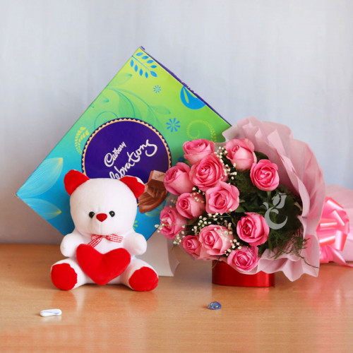 Celebrating With You: A Gift Combo of 10 pink roses, Cadbury Celebrations and 6 inch teddy bear