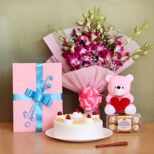 Classic Medley: A Gift Combo of 6 Orchids, 0.5 Kg Pineapple Cake, Greeting Card, 16 Ferrero Rocher and 6 Inch Teddy