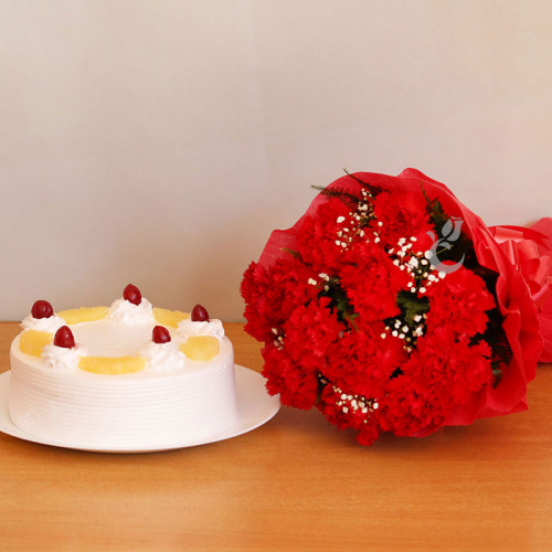 Perfect Expression: A Gift Combo of 12 Red Carnations and 0.5 Kg Pineapple Cake