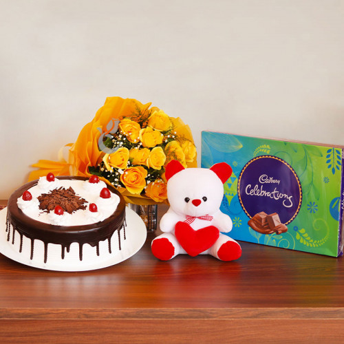 Celebrating Emotions: A Gift Combo of 12 Yellow Roses, 0.5 Kg Blackforest Cake, 6 Inch Teddy and 1 Celebration