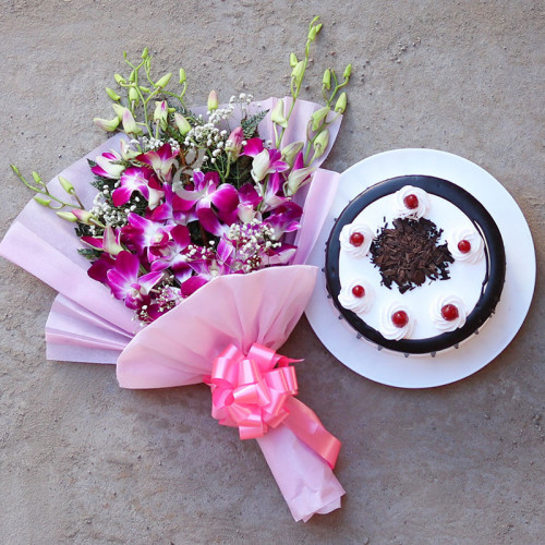 Orchid Special: A Gift Combo of 6 Purple Orchids and 0.5 Kg Blackforest Cake