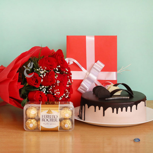 Poetic Love: A Gift Combo of 12 Red Roses, 0.5 Kg Chocolate Cake, 16 Ferrero Rocher and 1 Greeting Card