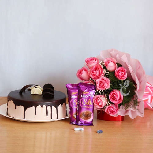 Perfect Love: A Gift Combo of 12 Pink Roses, 0.5 Kg Chocolate Cake and 2 Dairy Milk Silk