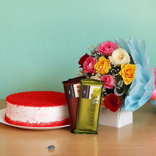 Love Eloquence: A Gift Combo of 12 Mix Roses, 0.5 Kg Red Velvet Cake and 2 Temptation
