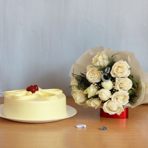 Symphony of Love: A Gift Combo of 12 White Roses and 0.5 Kg Butterscotch Cake