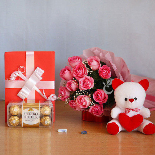 A Warm Hug: A Gift Combo of 10 Pink Roses, 6 Inch Teddy, 16 pcs Ferrero Rocher and 1 Greeting Card