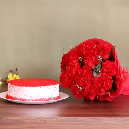 Red Love Story: A Gift Combo of 12 Carnations and 0.5 Kg Red Velvet Cake