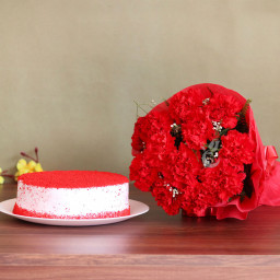 Red Love Story: A Gift Combo of 12 Carnations and 0.5 Kg Red Velvet Cake