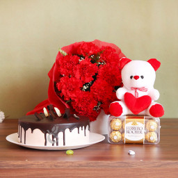 Dreamy Affair: A Gift Combo of 12 Carnation, 6 Inch Teddy, 16 Ferrero Rocher, and 0.5 Kg Chocolate Cake