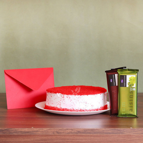 Alluring Great: A Gift Combo of 0.5 Kg Red Velvet Cake, 2 Temptations, and One Greeting Card
