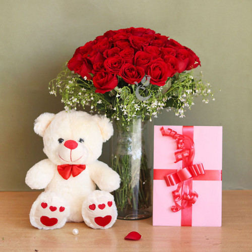 Love Confinement: A Gift Combo of 20 Red Roses, One Large Glass Vase, 12 Inch Teddy, and One Greeting Card